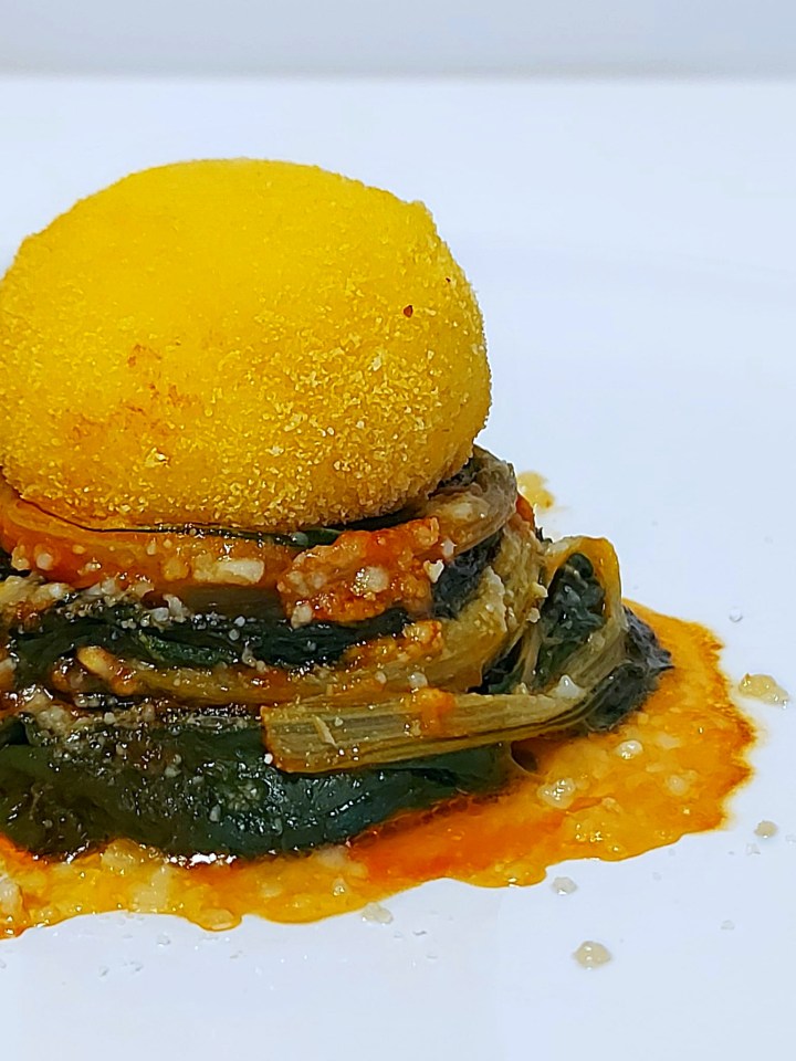 Bocconcini di mozzarella di bufala panati su nido di bieta&nbsp;gratinata