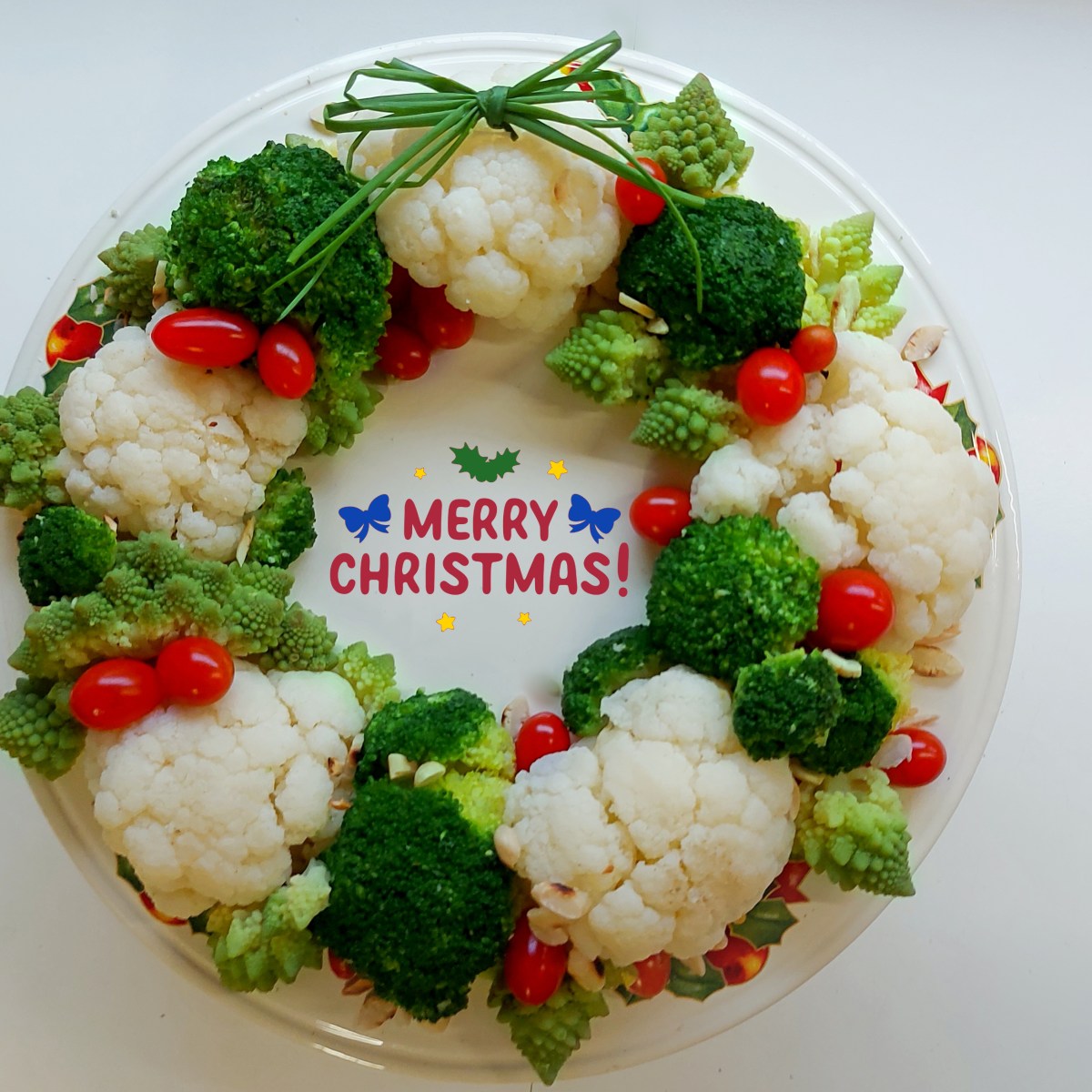 Ghirlanda di broccoli e cavolfiori in salsa&nbsp;capperugia