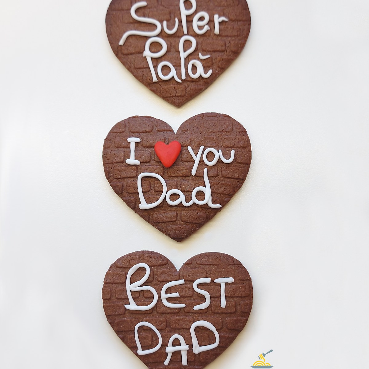 Biscotti di frolla al cacao decorati per la festa del&nbsp;papà